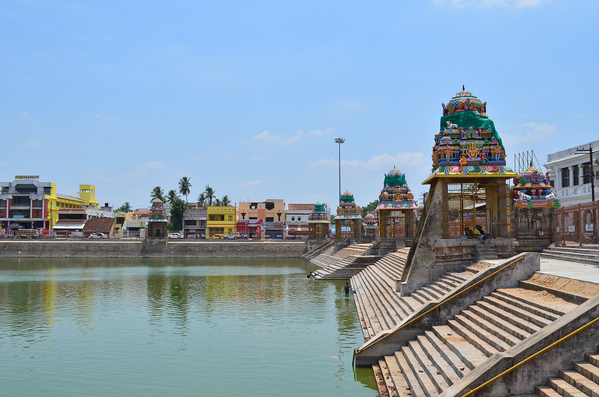 Mahamaham tank with temple gopurams and the town behind it, Kumbakonam